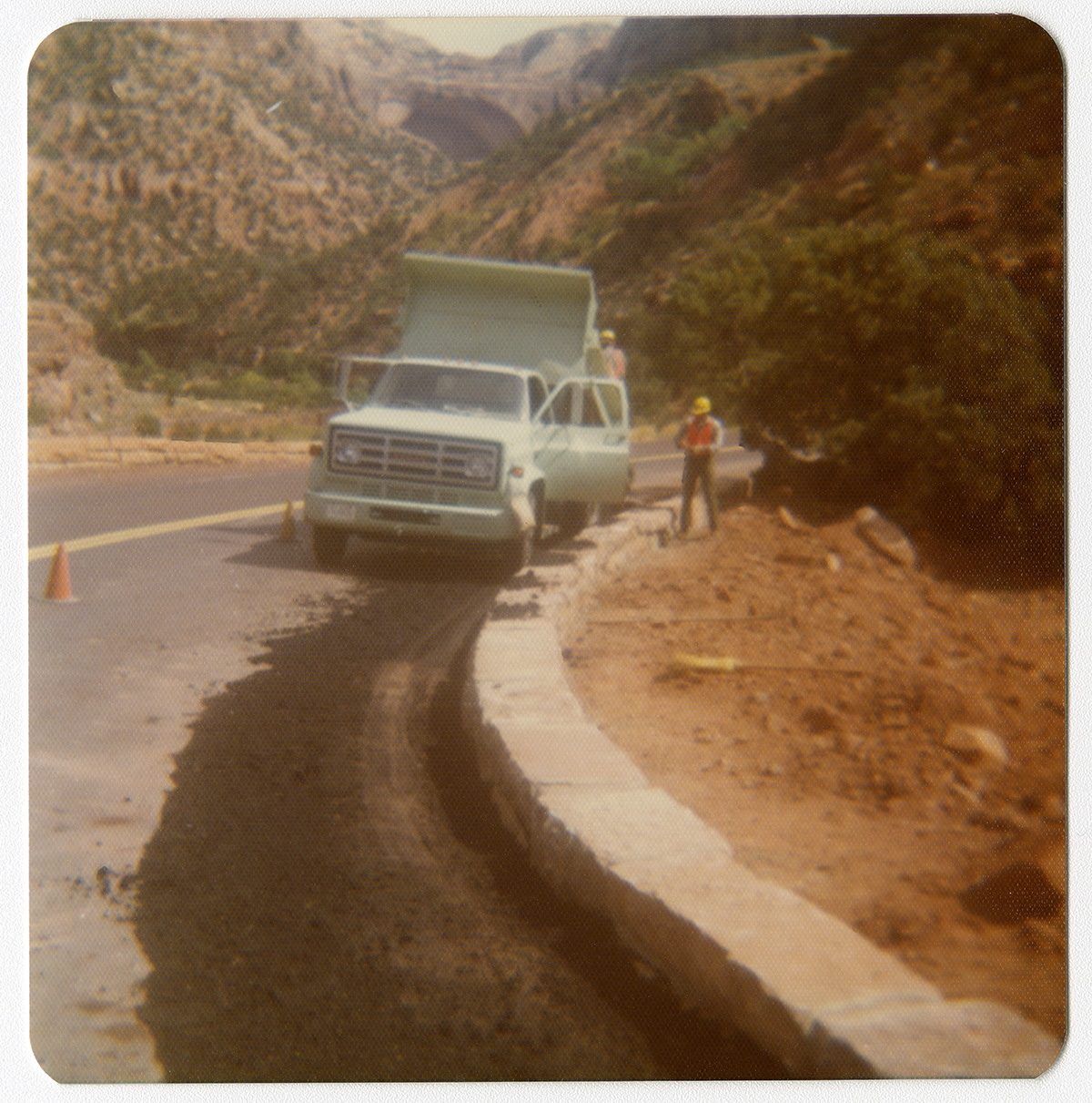A 1930s photograph of a road crew at work on the cliffside switchbacks of the Zion–Mount Carmel Highway, Zion National Park, Utah.