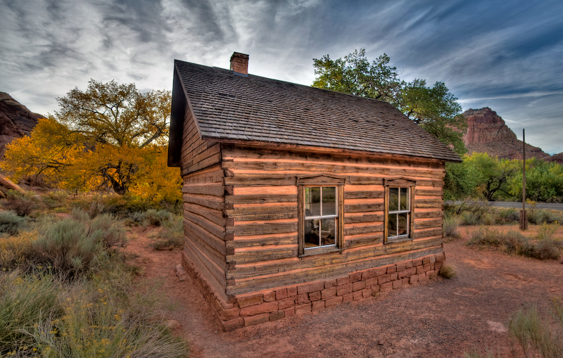 A 1964 Historic American Buildings Survey photograph of the one-room Fruita schoolhouse, built 1896, on Highway 24 in Capitol Reef National Park, Utah.