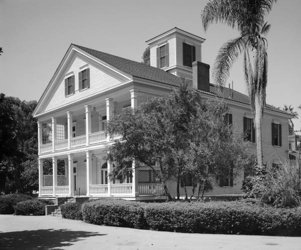 The Banning Residence in Wilmington, a two-storey house with a double veranda and a rooftop cupola, photographed for the Historic American Buildings Survey.