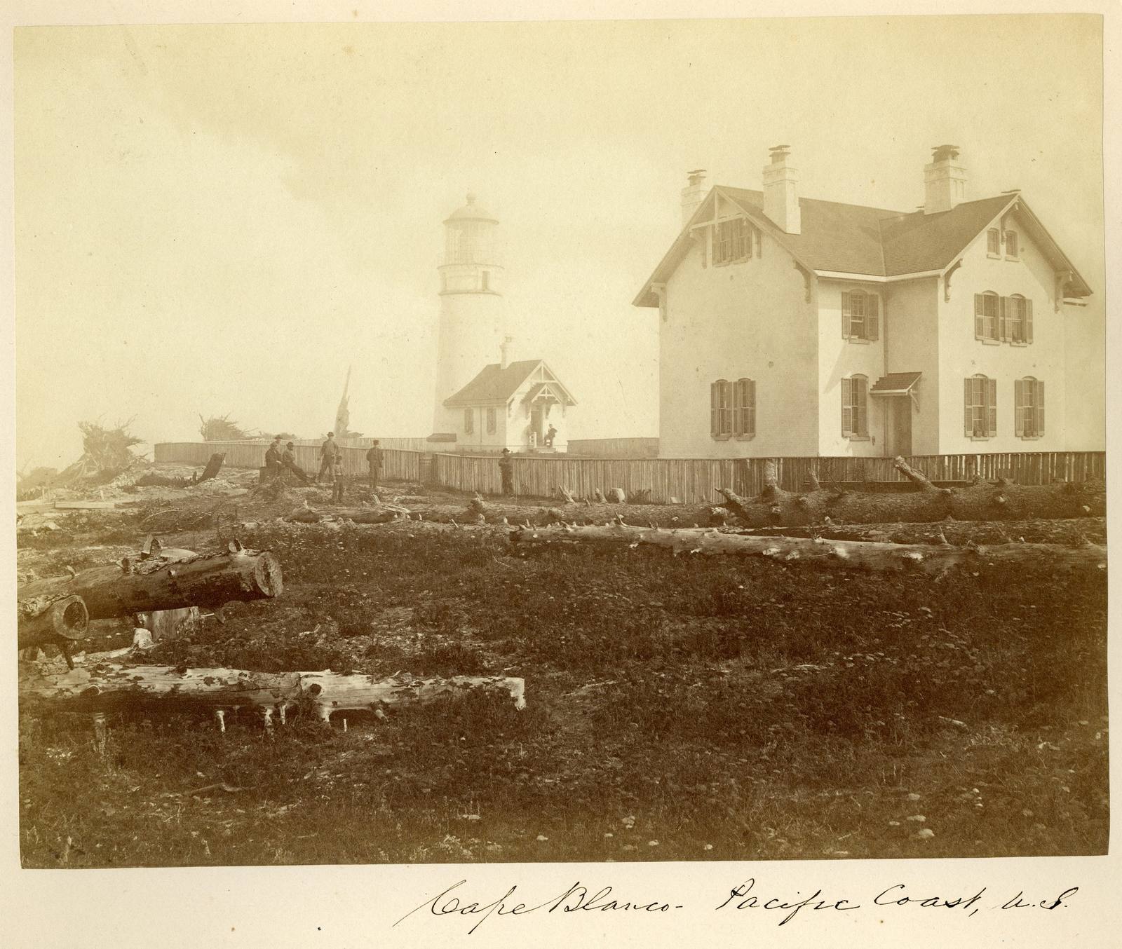 The Cape Blanco lighthouse and its keepers' dwelling in 1871, driftwood and cleared ground in front