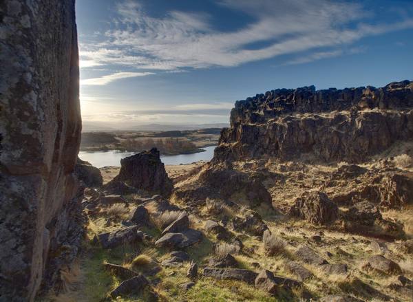 Basalt ledges of Horsethief Butte in Columbia Hills State Park, with Horsethief Lake and the Columbia beyond