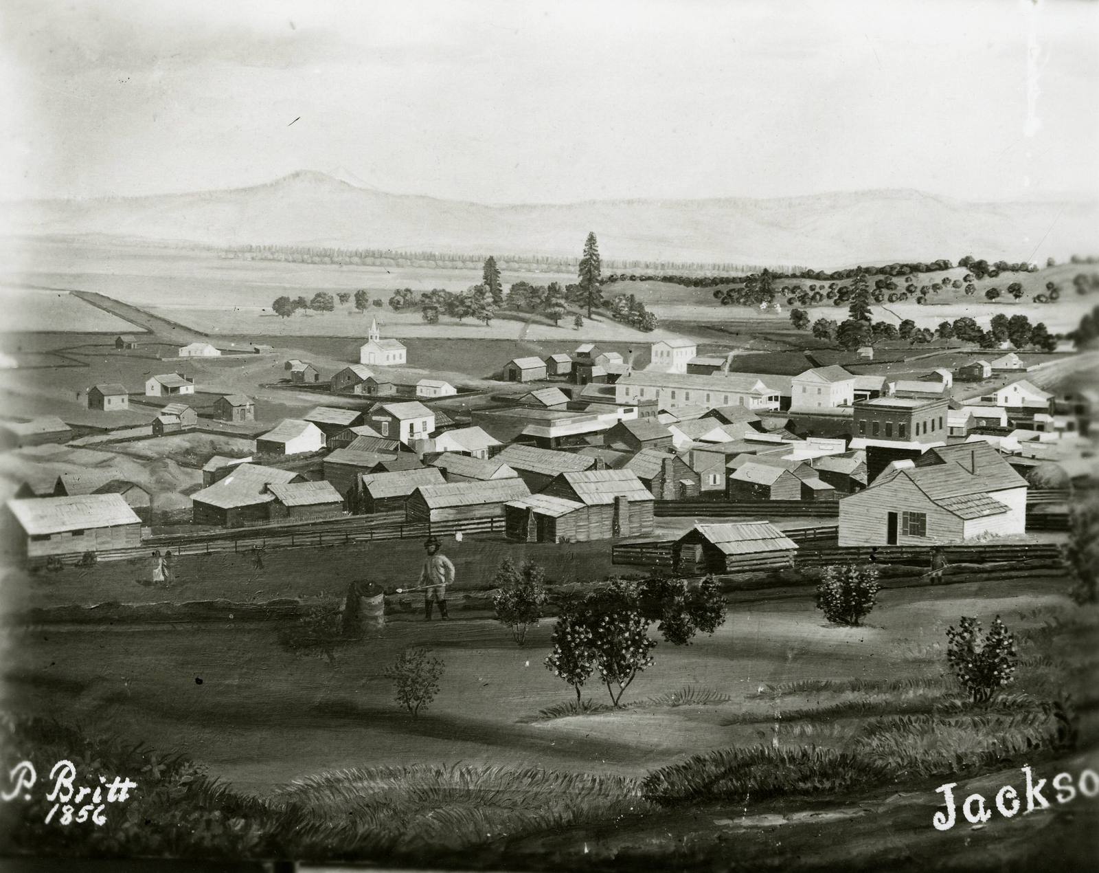 Peter Britt's 1856 photograph of Jacksonville from the hillside, the gold camp's wooden buildings spread below, signed P. Britt 1856