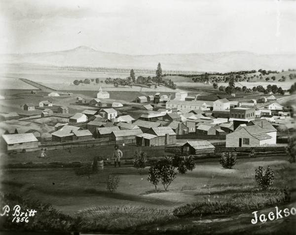 Peter Britt's 1856 photograph of Jacksonville from the hillside, the gold camp's wooden buildings spread below, signed P. Britt 1856