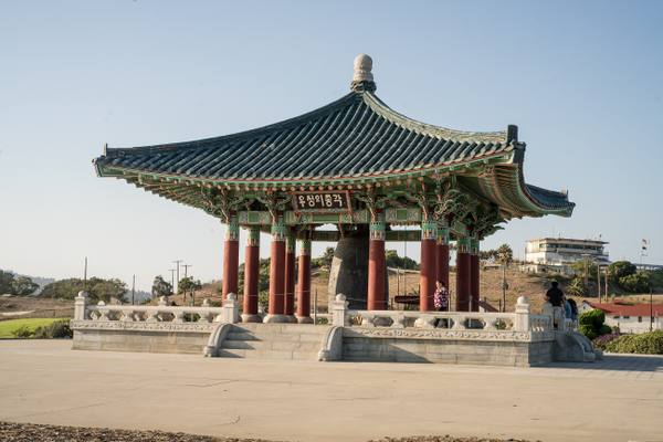 The Korean Friendship Bell hanging in its tiled stone pavilion on the bluff at Angels Gate, San Pedro.