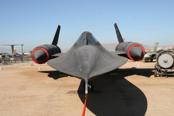 A Lockheed SR-71A Blackbird head-on on the apron at March Field Air Museum.