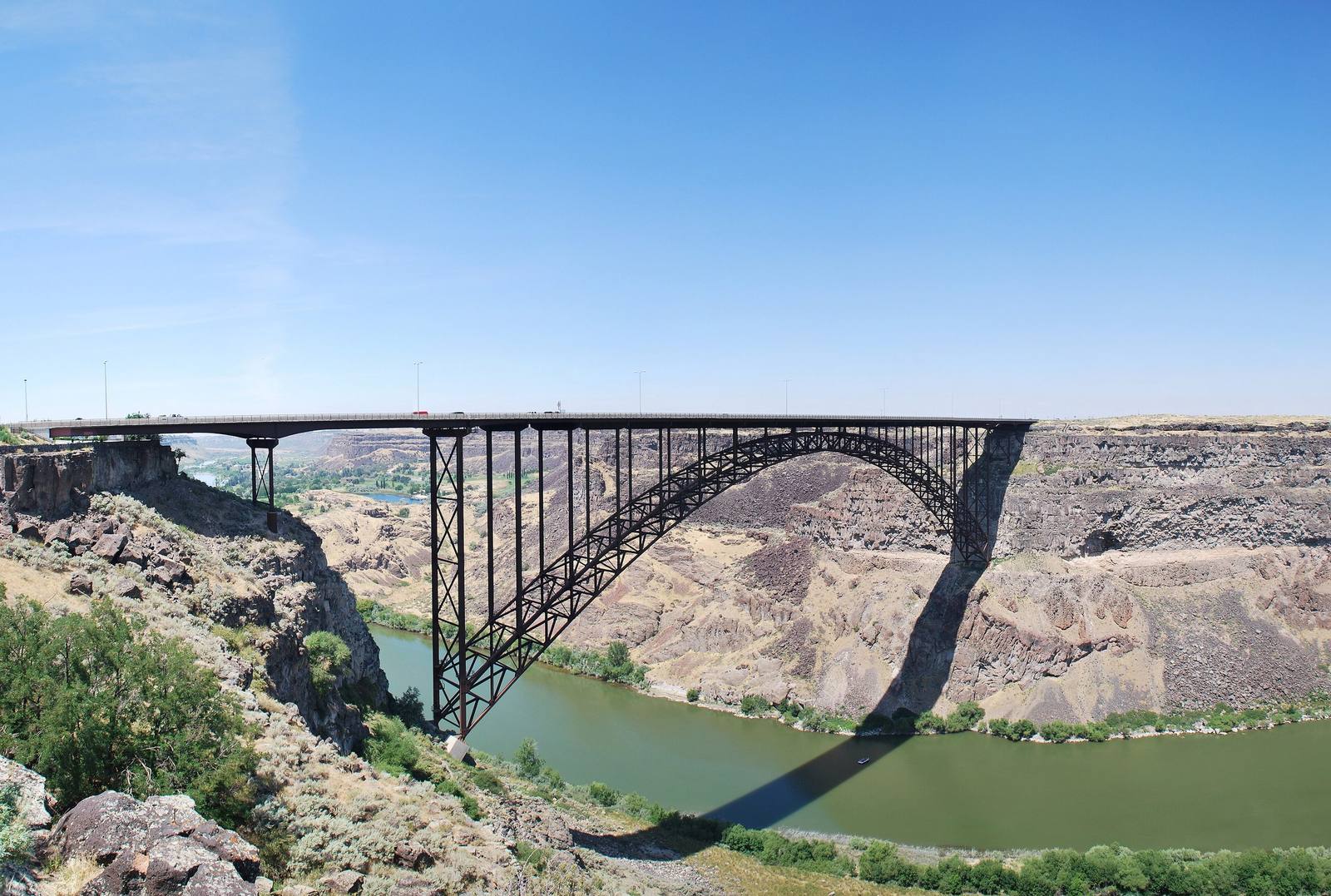 The steel arch of the Perrine Bridge spanning the Snake River Canyon, the river far below