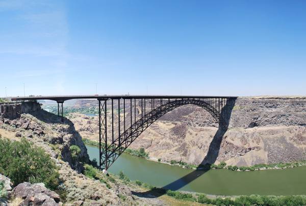 The steel arch of the Perrine Bridge spanning the Snake River Canyon, the river far below