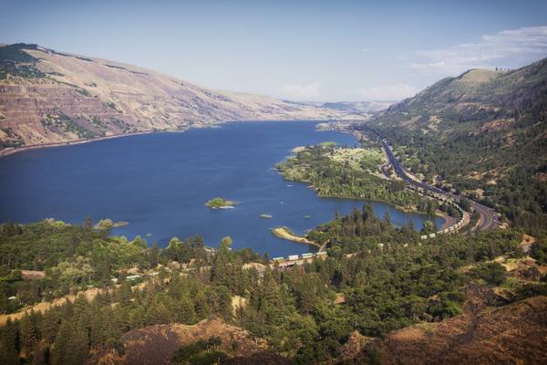 The Columbia River east from Rowena Crest, the gorge opening into dry hills and the old highway below