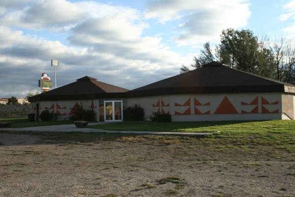 The low peaked-roof building of the Shoshone-Bannock Tribal Museum at Fort Hall