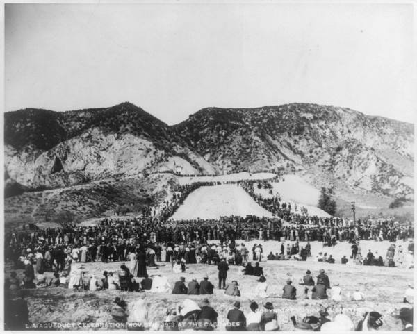 A crowd of several thousand covering the hillside at the Cascades on November 5, 1913, watching the first Owens Valley water arrive.