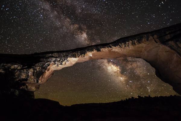 The Milky Way arching over Owachomo Bridge at Natural Bridges National Monument, Utah — the world's first International Dark Sky Park.
