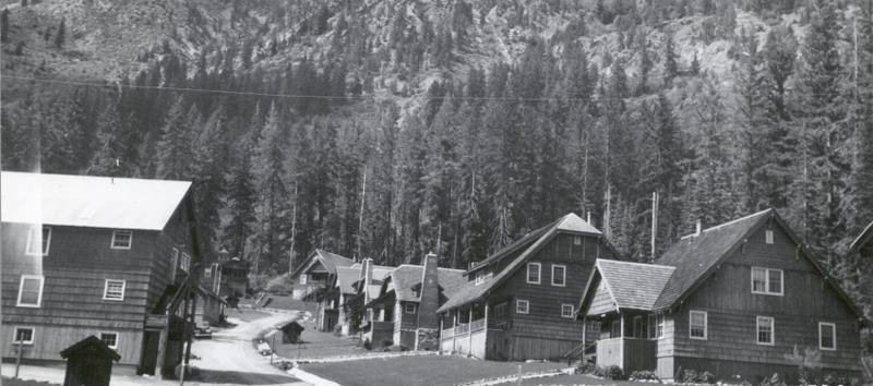 Holden in the late 1930s, the mining company's shingled houses and dormitories lining a dirt street below a steep forested slope