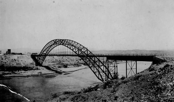 The Trails Arch Bridge carrying the highway across the Colorado River between Topock, Arizona and Needles, California, photographed about 1920.