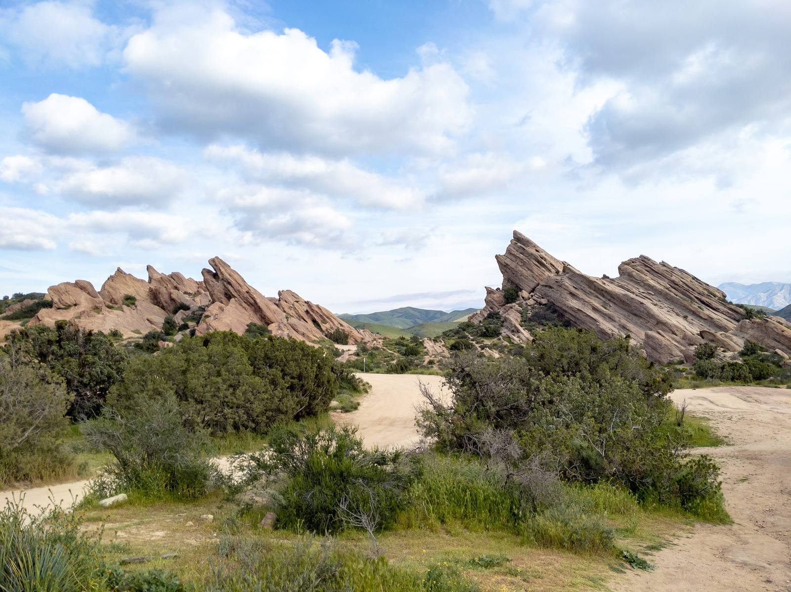 The park trail running between two groups of canted Vasquez Formation fins at Vasquez Rocks, Agua Dulce.