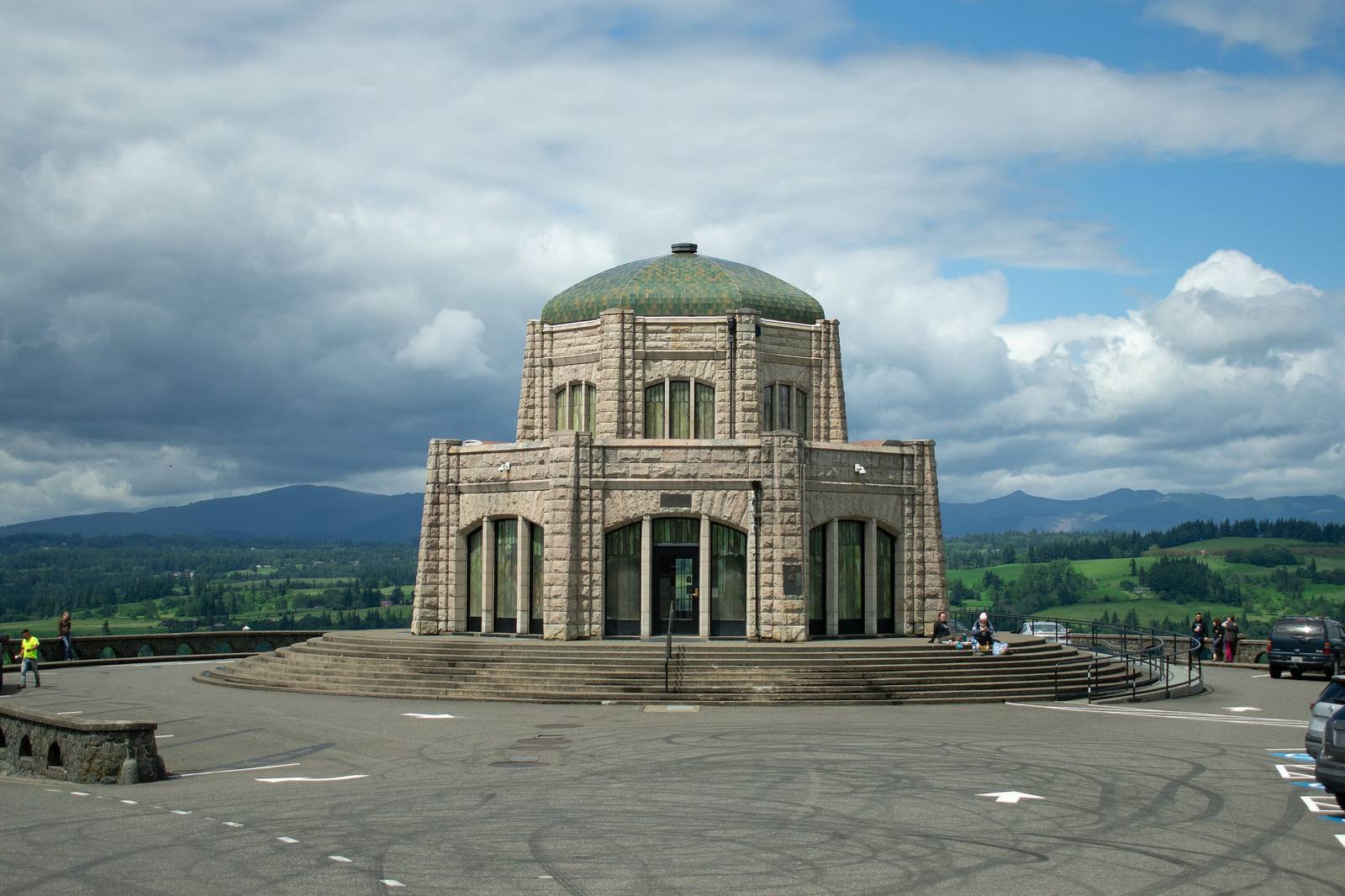 Vista House, the domed stone octagon on Crown Point, under a broken sky